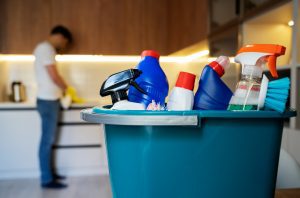 man servant doing chores around house 300x198